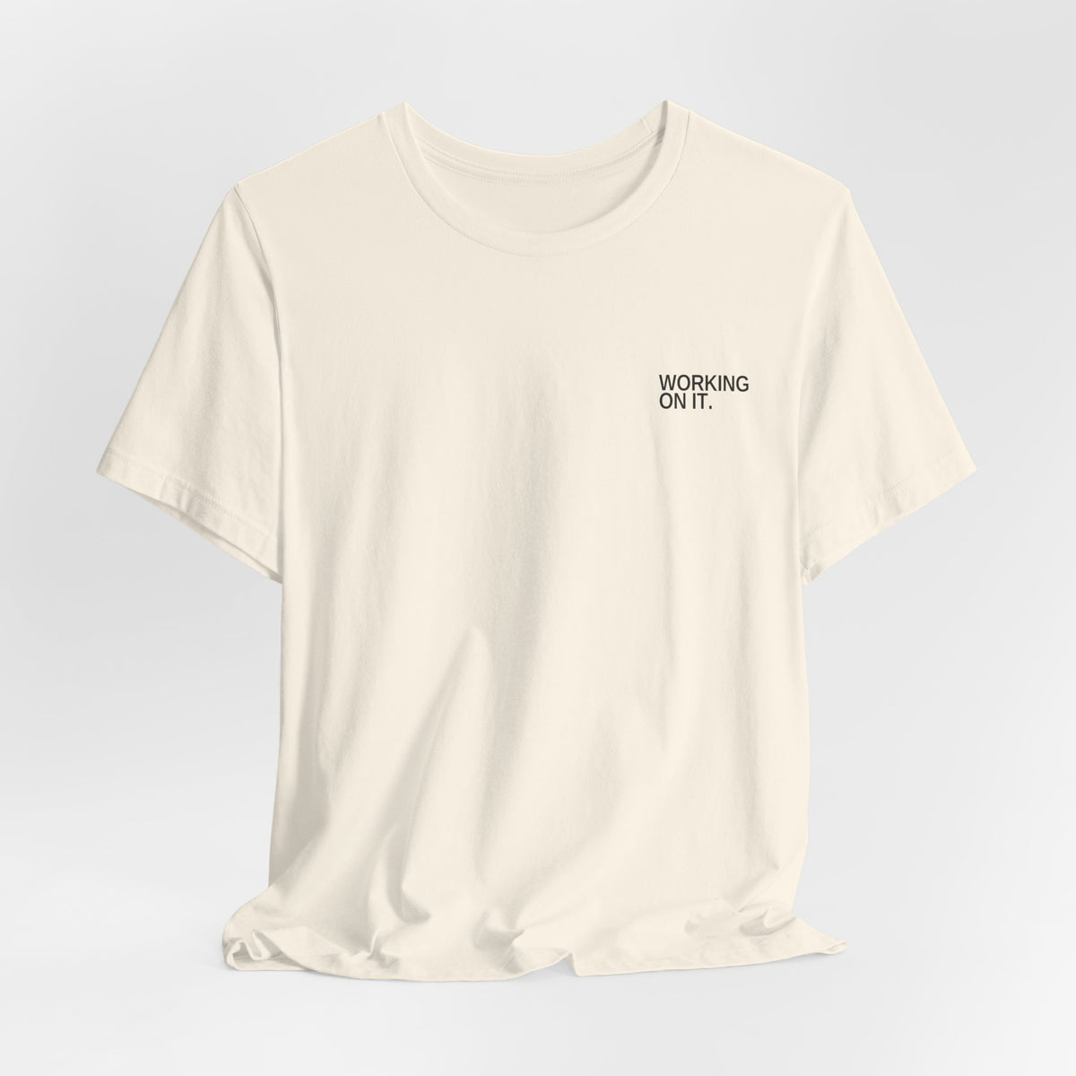 Working On It. Unisex T-Shirt
