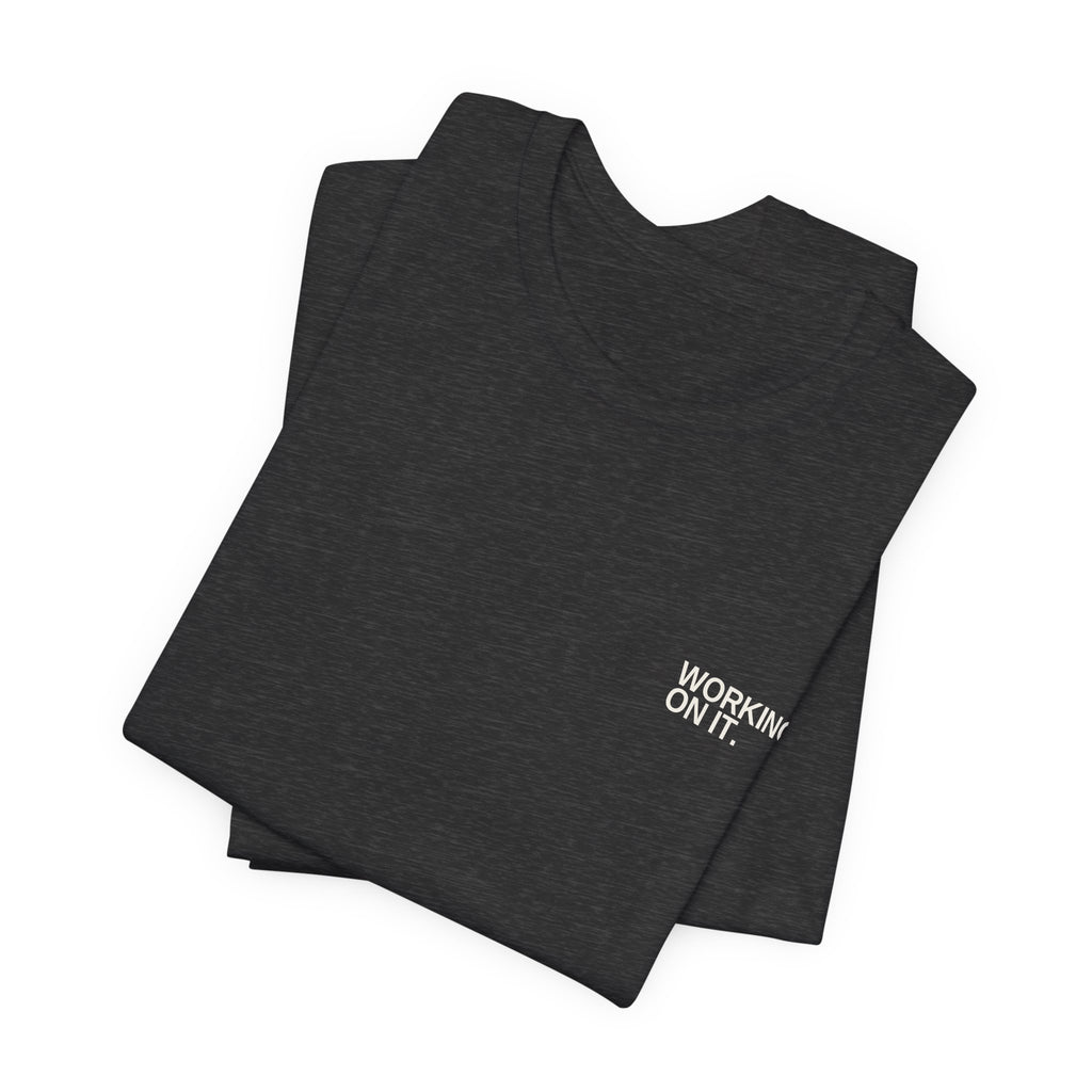 Working On It. Unisex T-Shirt – Dark Colours