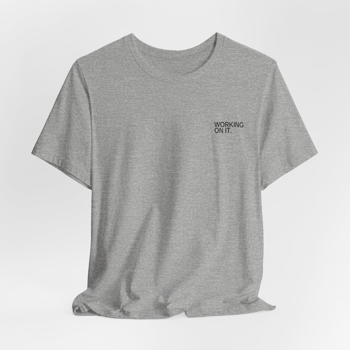 Working On It. Unisex T-Shirt