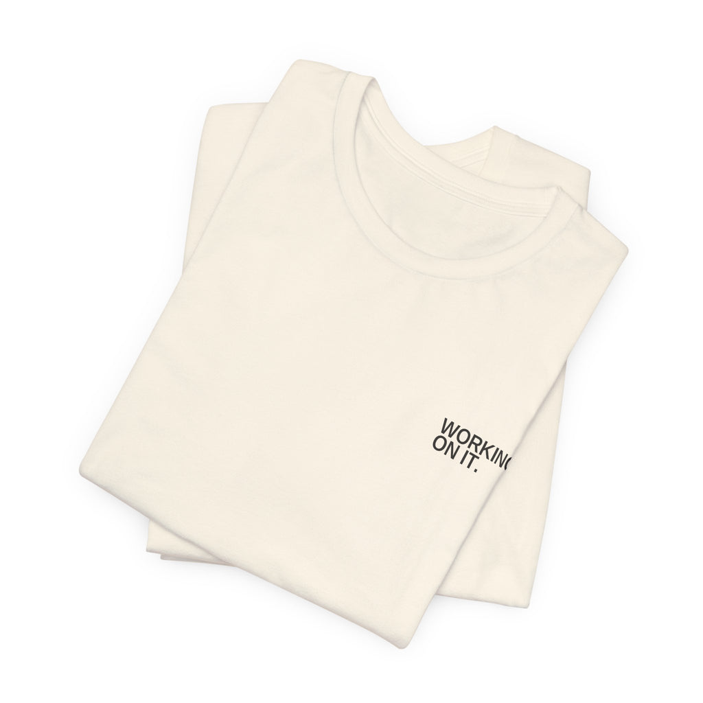 Working On It. Unisex T-Shirt